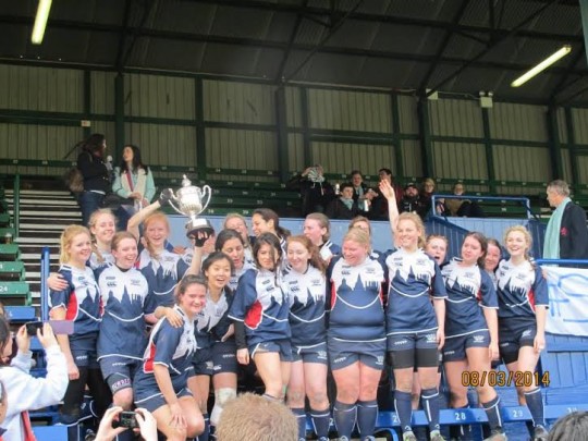 Millie (second from left) celebrates with OUWRFC