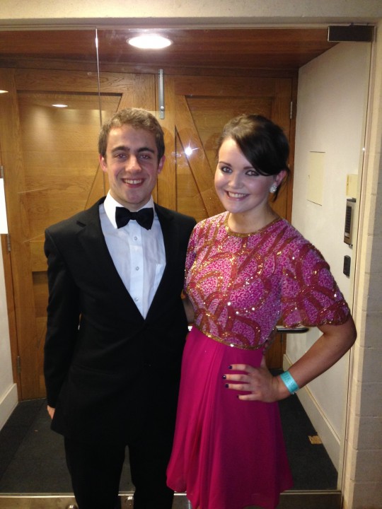 You can't beat a fitted tux and the lady to his right looks stunning in this gorgeous embellished dress! 