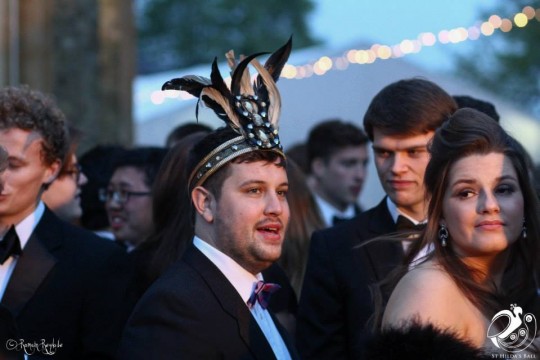 This gentleman ups to headdress ante is an extravagant, feathered piece