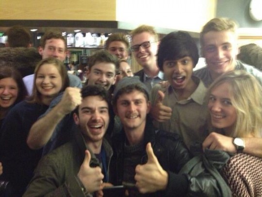 OUSU president LJ Trup (centre)