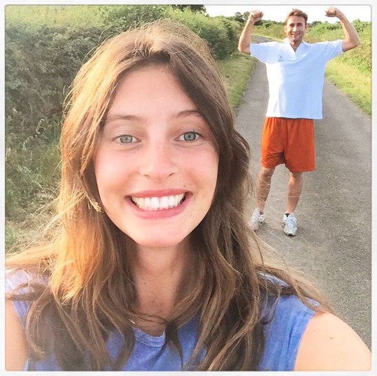 Ella, pictured with her fiancée, not crying