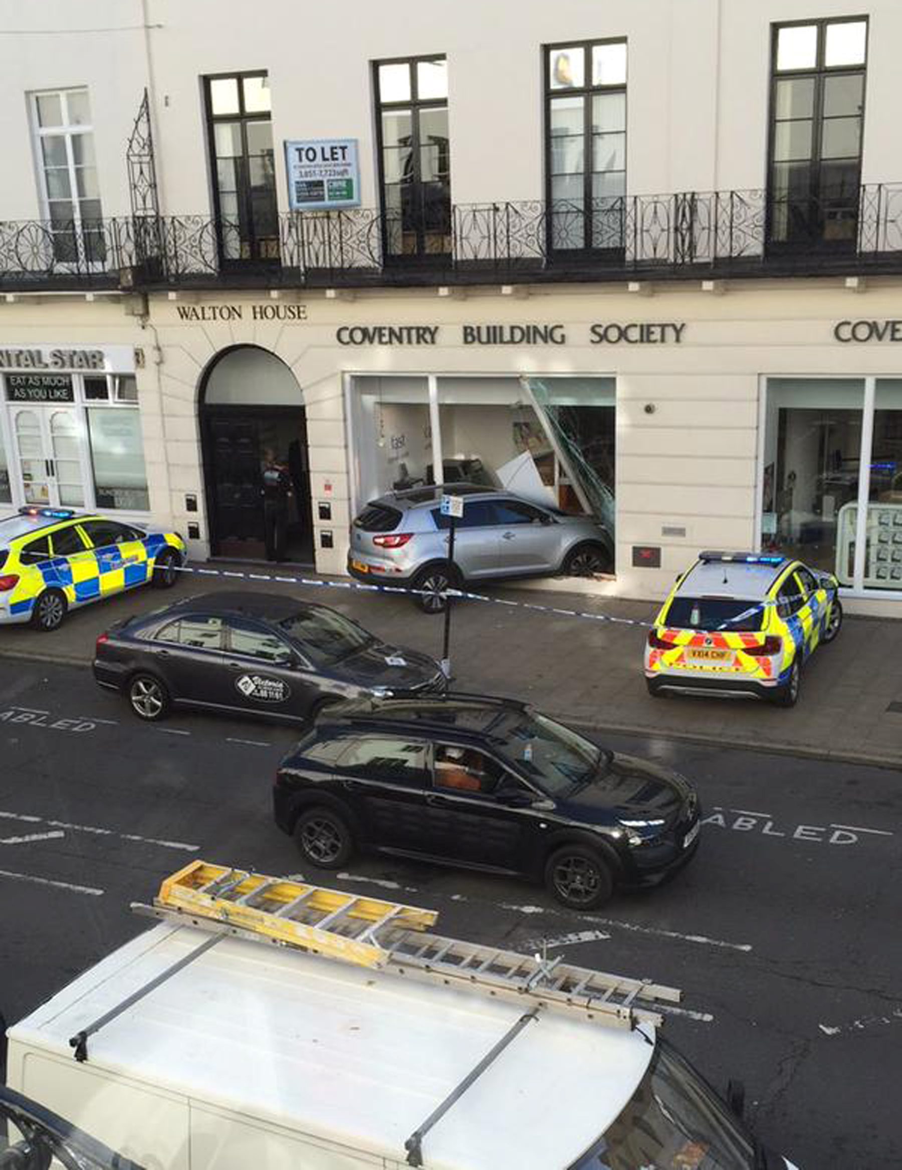 A car crashed through the window of Coventry Building SocietyÃs, Leamington town centre branch this morning.  See NTI story NTIROBBERY.  The incident happened shortly before 9am this morning as commuters made their way to work in the busy Leamington town centre.  A grey Kia smashed through the front window of the building societyÃs upper Parade branch.  Warwickshire Police are at the scene, but nobody has been arrested and it is not yet known if anyone has been injured.  A spokesman for Warwickshire Police said: "We were called just after 8.30am to reports of a robbery at Coventry Building Society on the Parade, in Leamington Spa.  Officers are currently at the scene dealing with the incident."