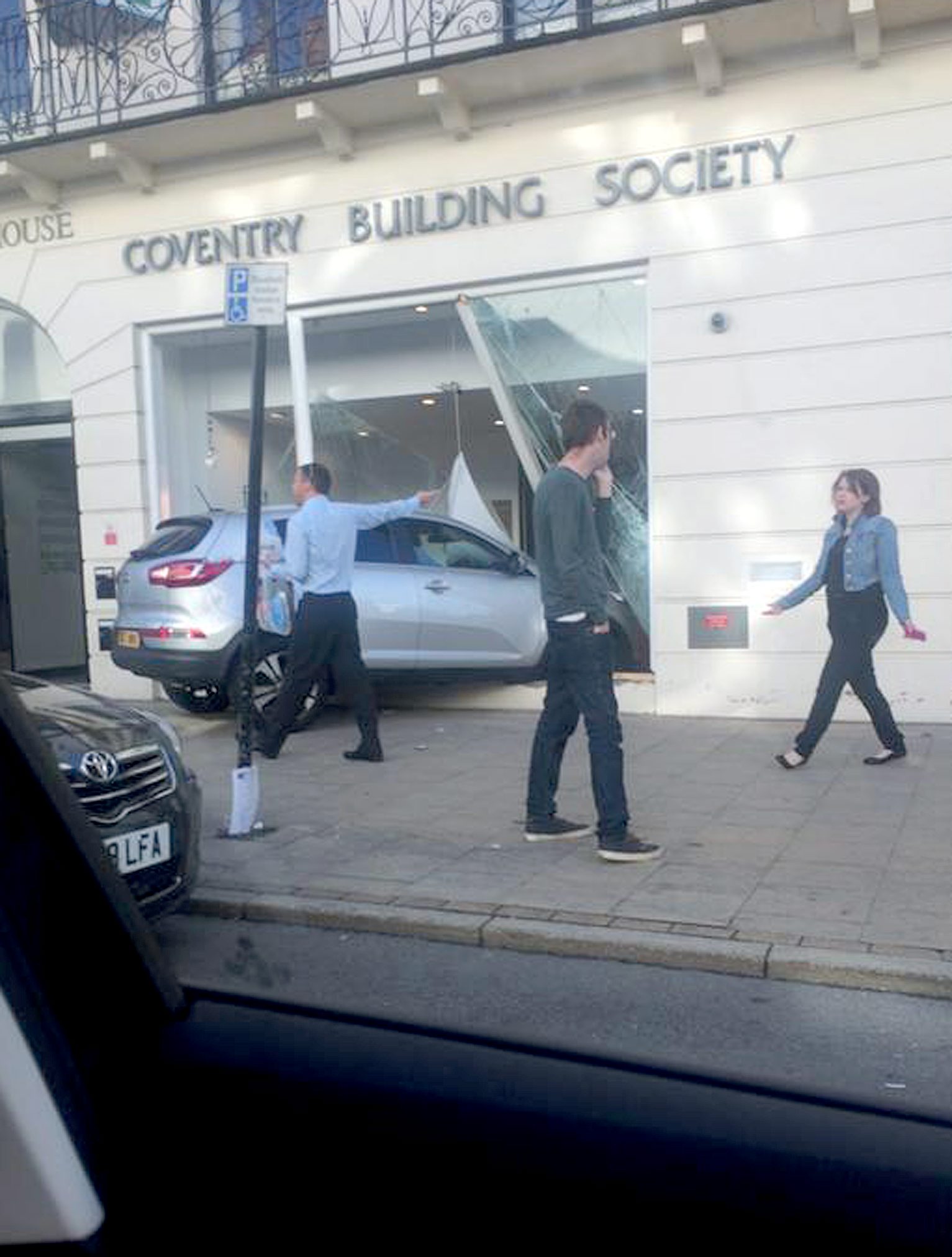 A car crashed through the window of Coventry Building SocietyÃs, Leamington town centre branch this morning.  See NTI story NTIROBBERY.  The incident happened shortly before 9am this morning as commuters made their way to work in the busy Leamington town centre.  A grey Kia smashed through the front window of the building societyÃs upper Parade branch.  Warwickshire Police are at the scene, but nobody has been arrested and it is not yet known if anyone has been injured.  A spokesman for Warwickshire Police said: "We were called just after 8.30am to reports of a robbery at Coventry Building Society on the Parade, in Leamington Spa.  Officers are currently at the scene dealing with the incident."