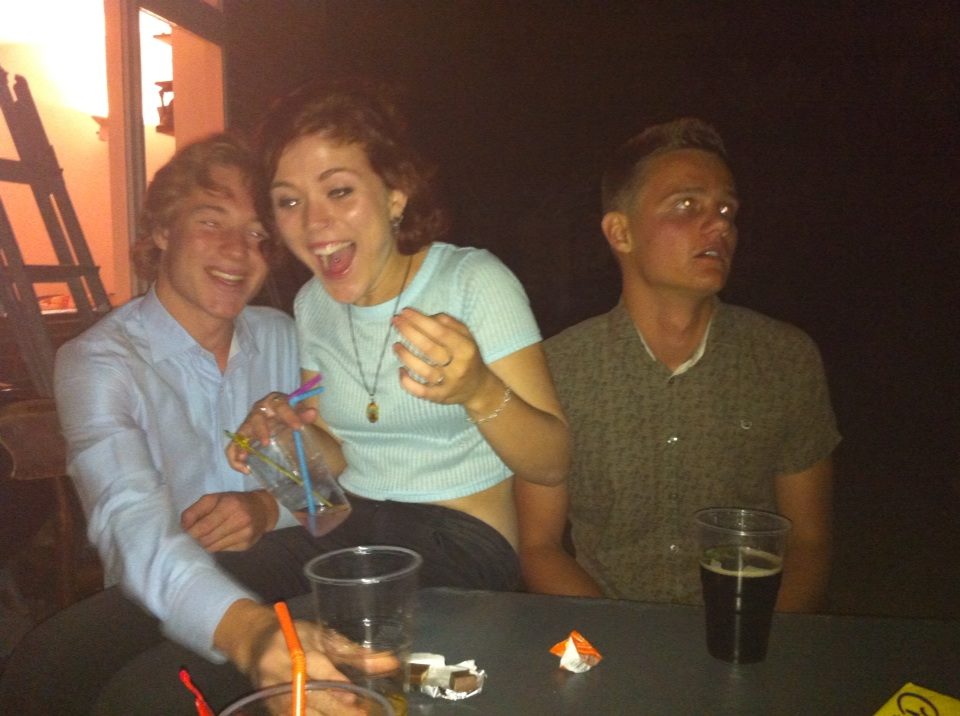 The classic Vodka-Coke drinking, inevitably not enjoying themselves.