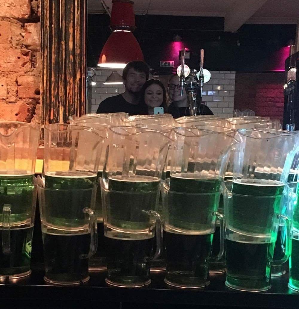 Image may contain: Night Life, Night Club, Drink, Beverage, Bowl, Glass
