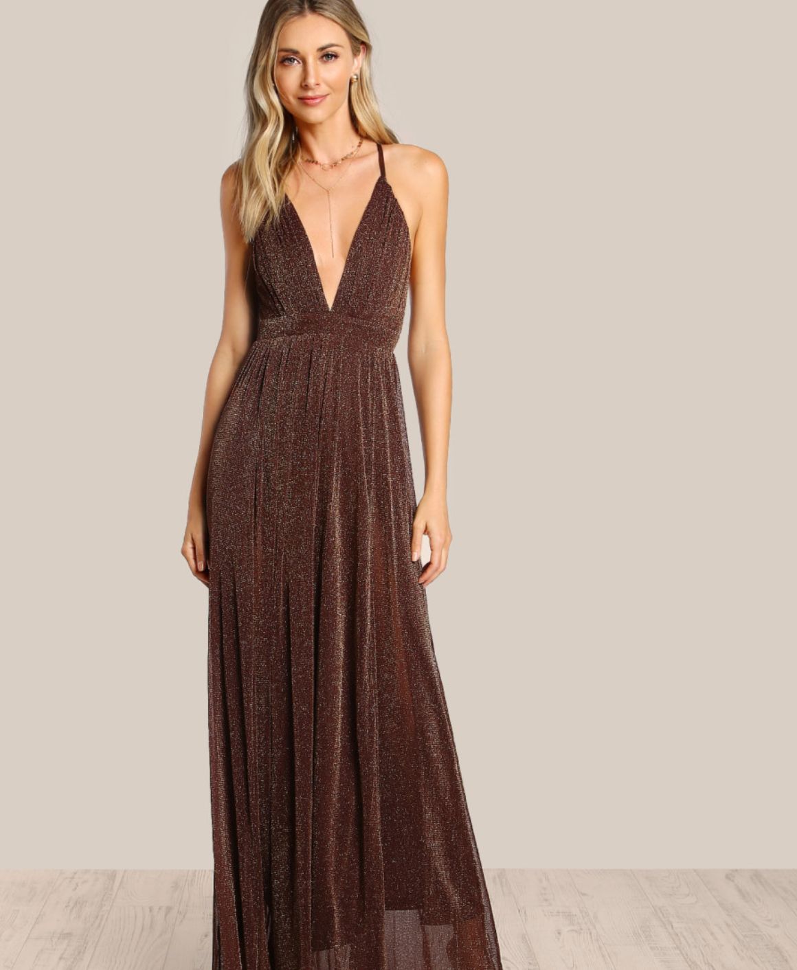 Image may contain: Evening Dress, Robe, Gown, Dress, Clothing, Person, People, Human