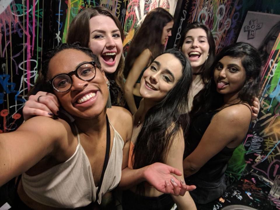 Image may contain: Party, Crowd, Vase, Pottery, Potted Plant, Plant, Jar, Flora, Person, People, Human