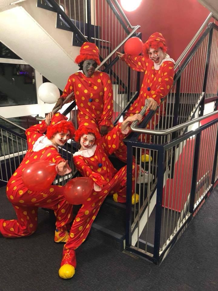 Image may contain: Festival, Crowd, Person, Performer, Human, Clown