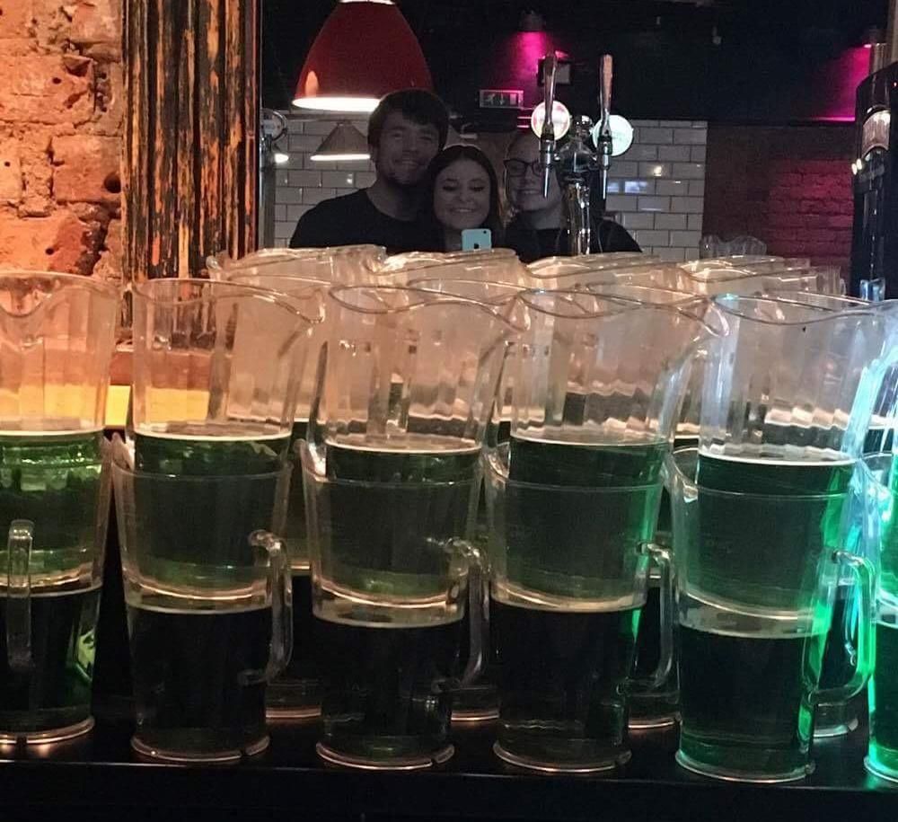 Image may contain: Glass, Drink, Beverage, Person, People, Human