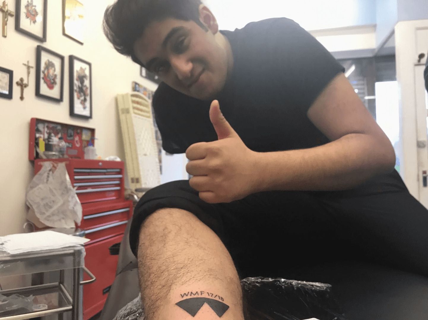 Image may contain: Finger, Face, Tattoo, Human, Person, Skin