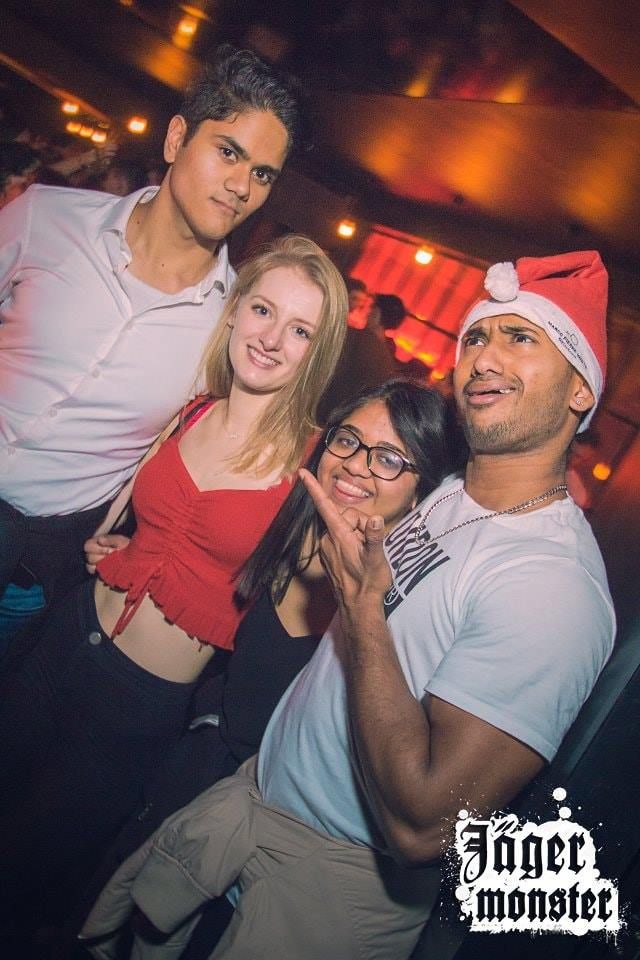 Image may contain: Disco, Bar Counter, Pub, Night Club, Party, Club, Person, Human, Accessory, Accessories, Glasses