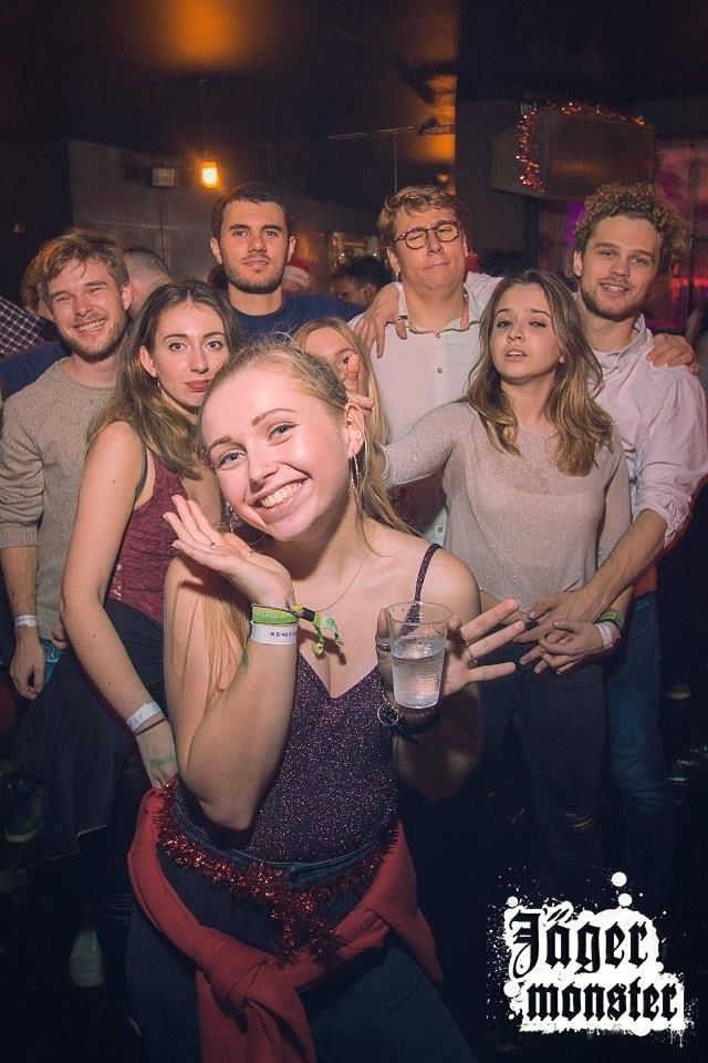 Image may contain: Glasses, Accessory, Accessories, Pub, Bar Counter, Drink, Beverage, Night Life, Night Club, Club, Human, Person, Party
