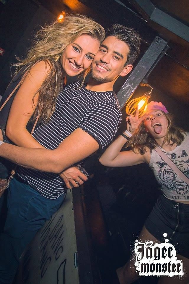 Image may contain: Pub, Disco, Tattoo, Night Life, Skin, Person, Human, Party, Night Club, Club