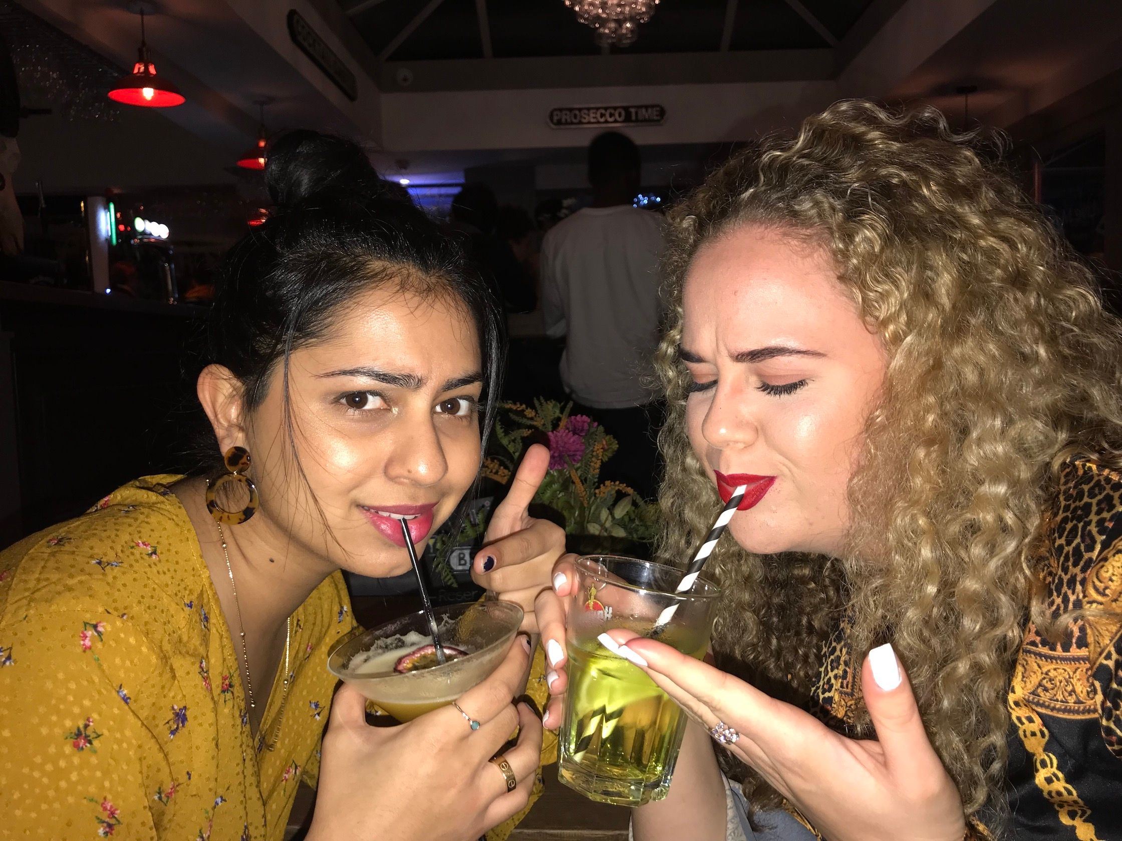 Image may contain: Finger, Alcohol, Bar Counter, Glass, Pub, Beverage, Drink, Night Life, Human, Person