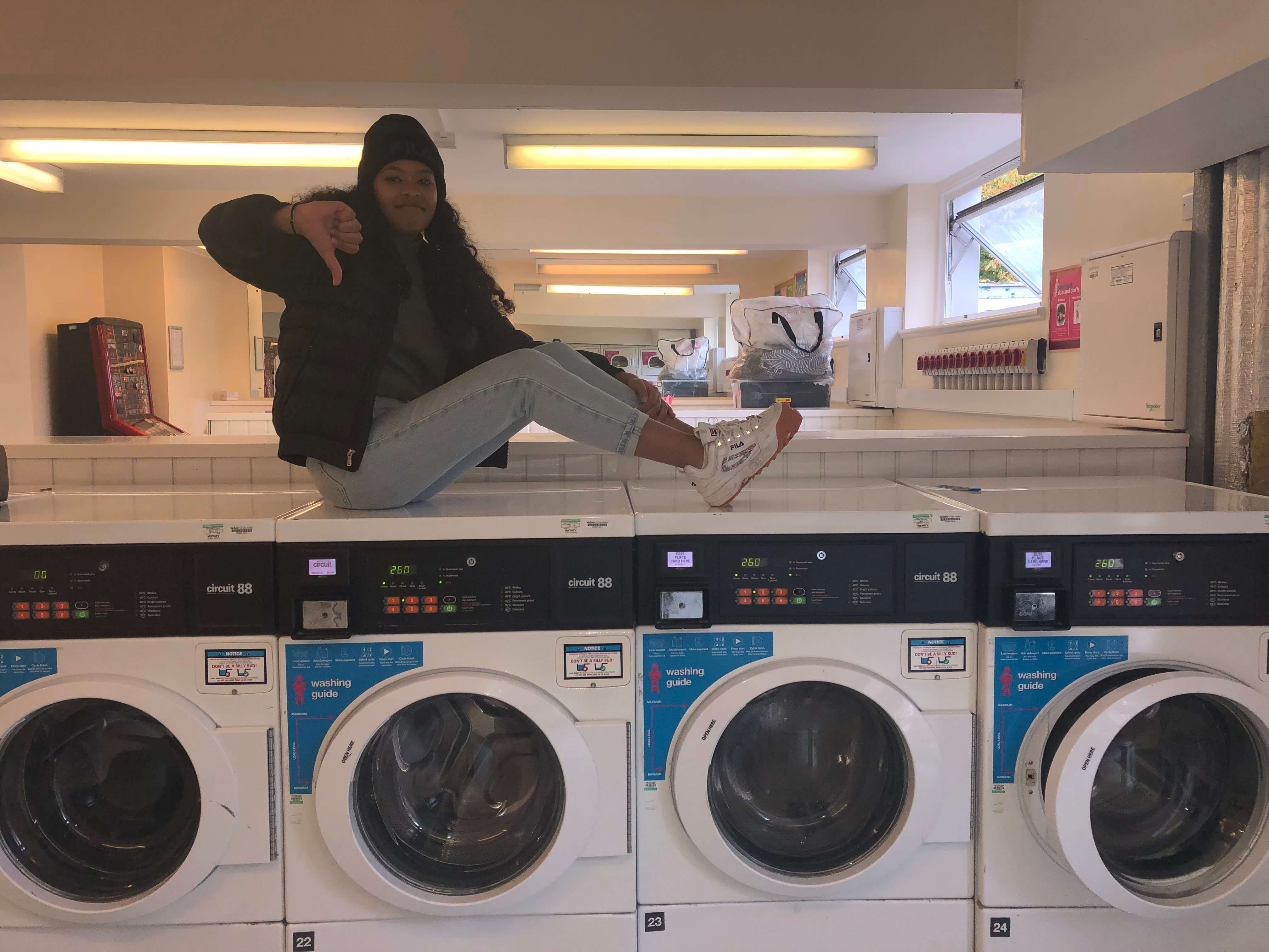 Image may contain: Appliance, Laundry, Human, Person