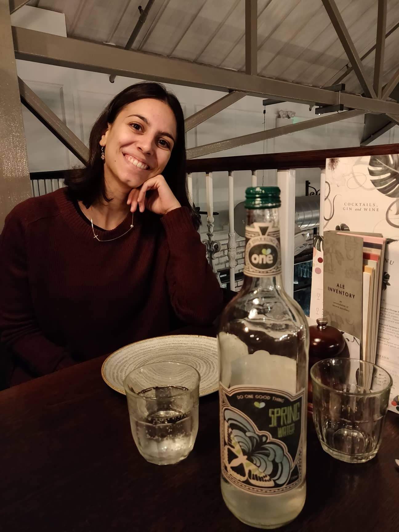 Image may contain: Bar Counter, Bottle, Pub, Liquor, Glass, Beer, Drink, Alcohol, Beverage, Human, Person