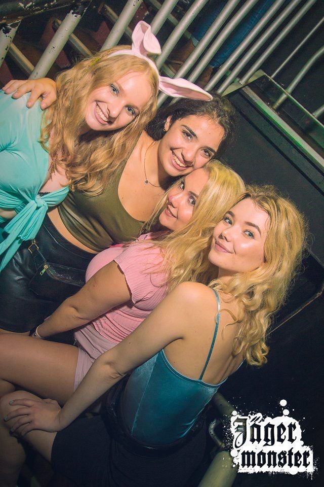Image may contain: Clothing, Apparel, Face, Party, Night Club, Person, Human, Club