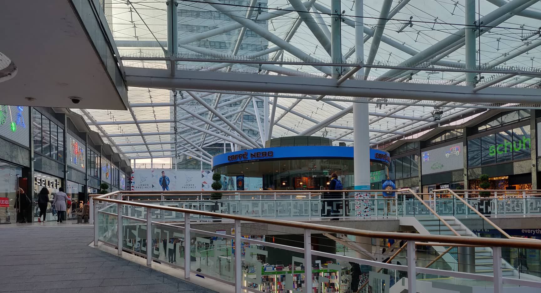 Image may contain: Terminal, Architecture, Building, Railing, Human, Person, Banister, Handrail