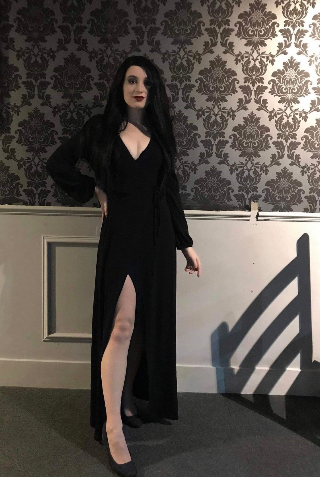 Image may contain: Dress, Robe, Gown, Evening Dress, Fashion, Person, Human, Long Sleeve, Apparel, Sleeve, Clothing