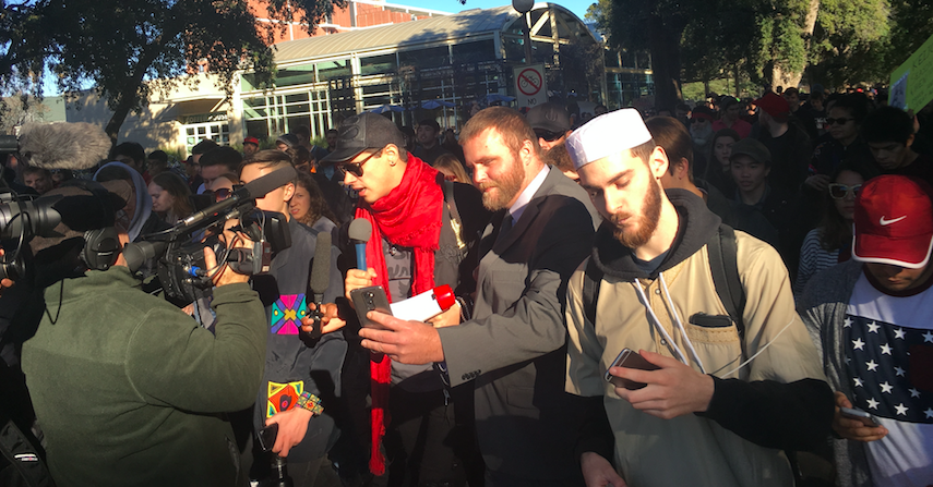 Protesters and Milo fans surround him at UC Davis on college campus