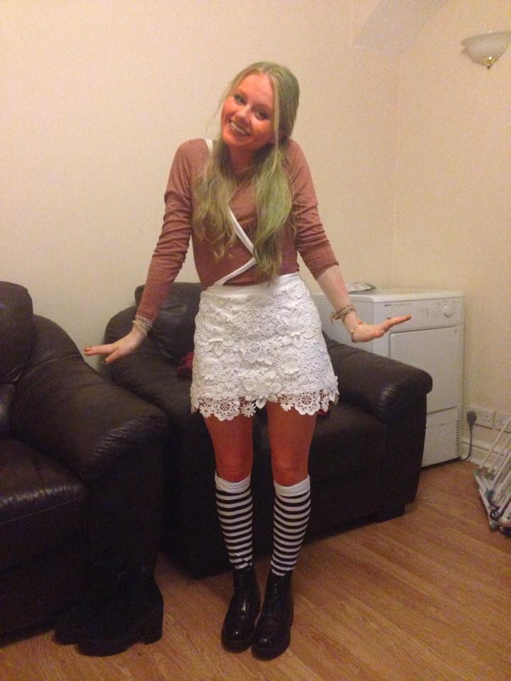 Green hair dye and orange body paint