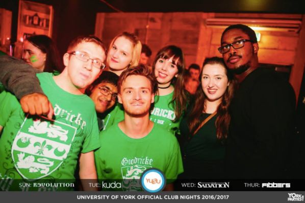 Image may contain: Team, Night Life, Night Club, Club, Person, People, Human