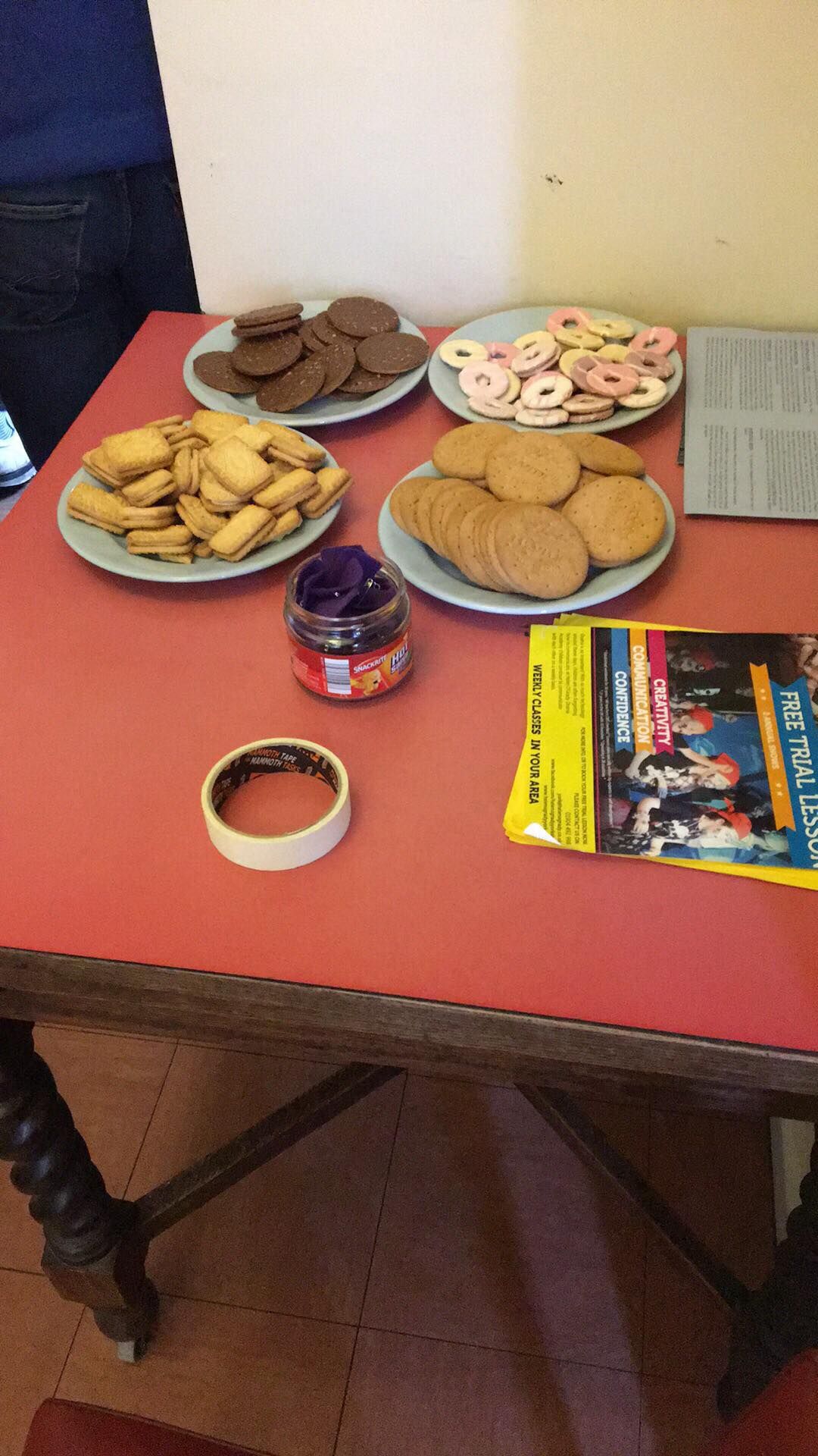 Image may contain: Table, Furniture, Coffee Table, Food, Cookie, Biscuit, Person, People, Human