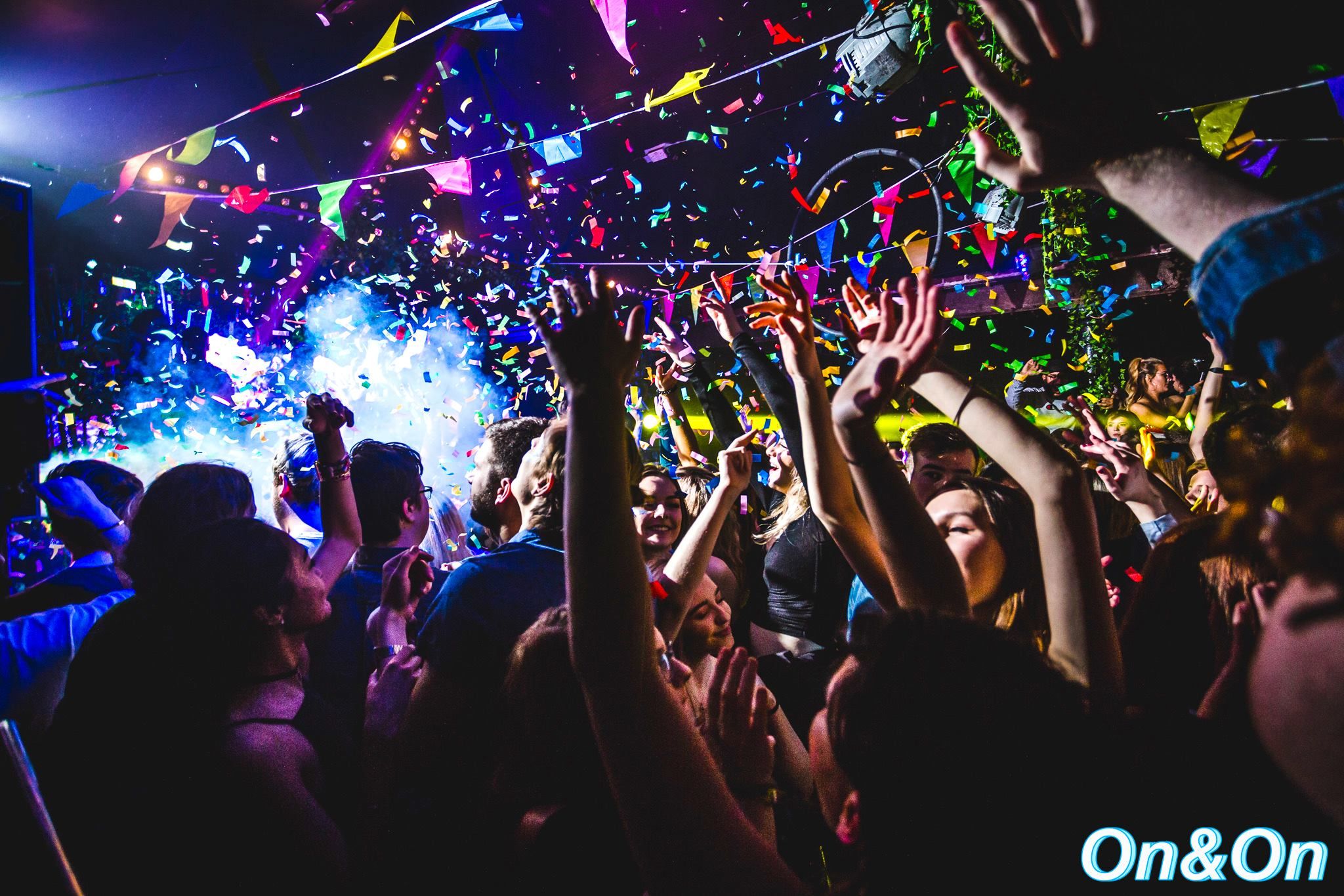 Image may contain: Crowd, Paper, Confetti, Person, People, Human, Music, Leisure Activities