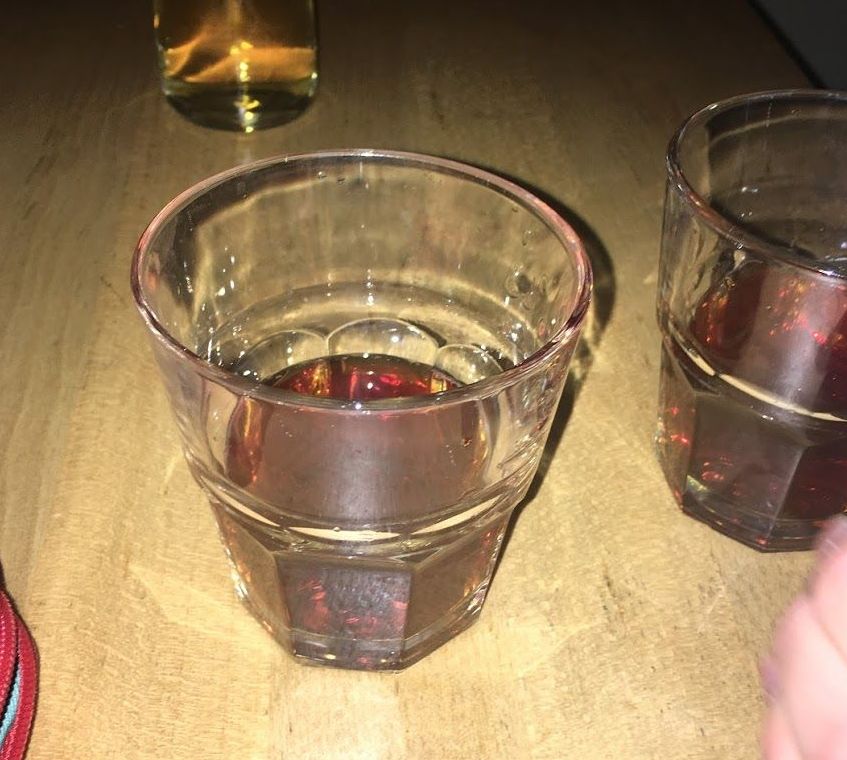 Image may contain: Beer Glass, Goblet, Beer, Cocktail, Liquor, Drink, Beverage, Alcohol, Person, Human, Clothing, Helmet, Apparel, Glass