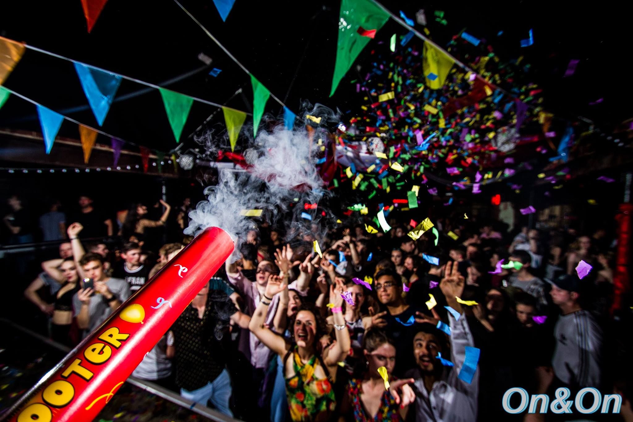 Image may contain: Festival, Club, Night Life, Crowd, Confetti, Paper, Human, Person