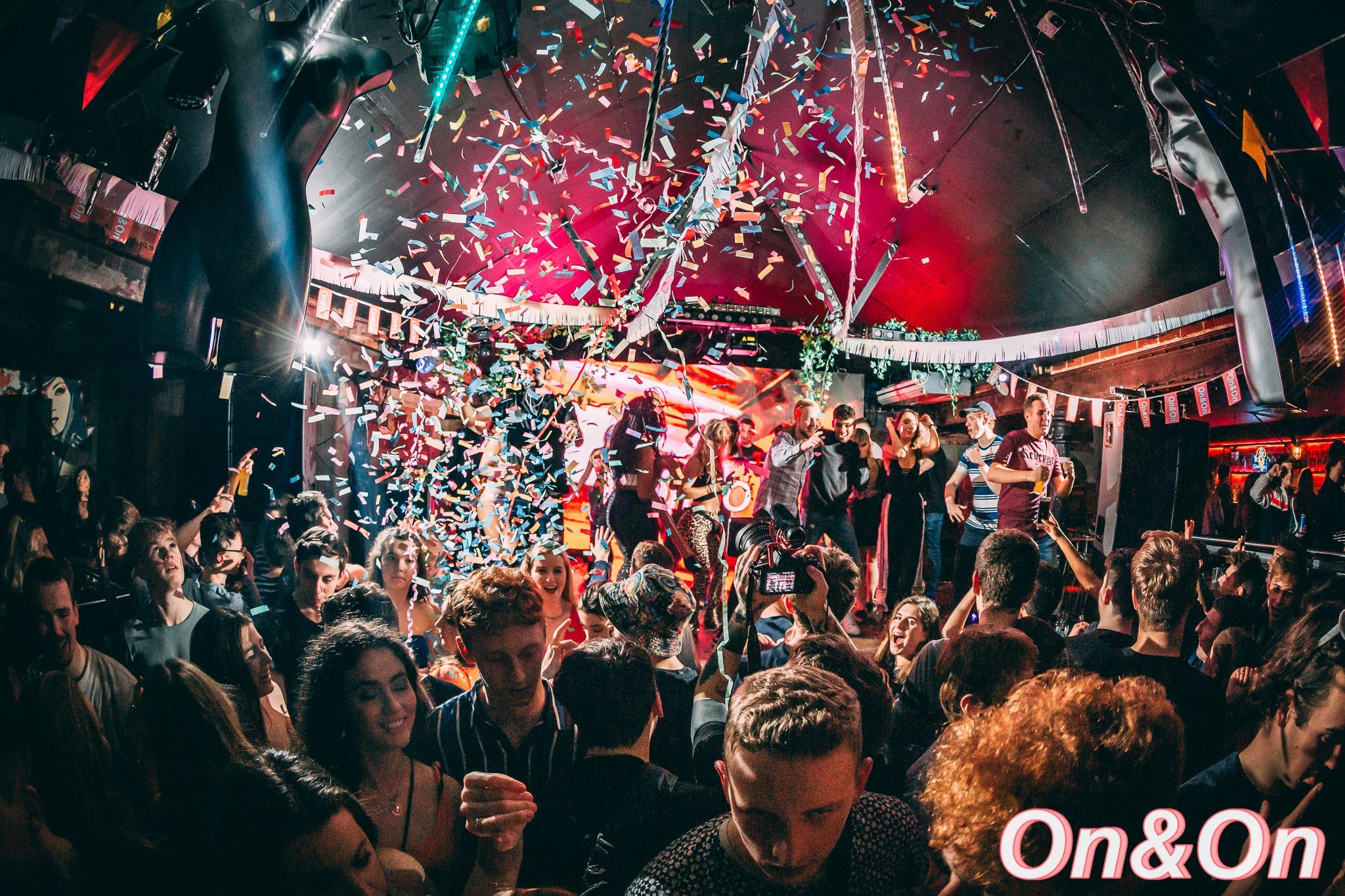 Image may contain: Festival, Confetti, Party, Paper, Night Club, Crowd, Club, Human, Person
