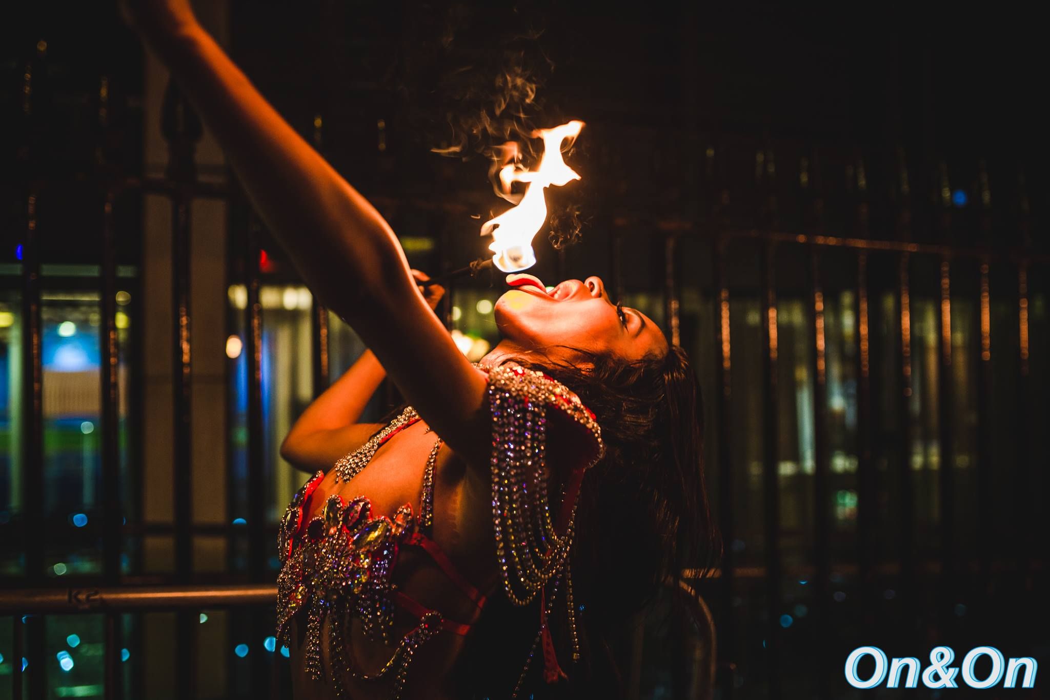 Image may contain: Flame, Dance Pose, Leisure Activities, Fire, Human, Person