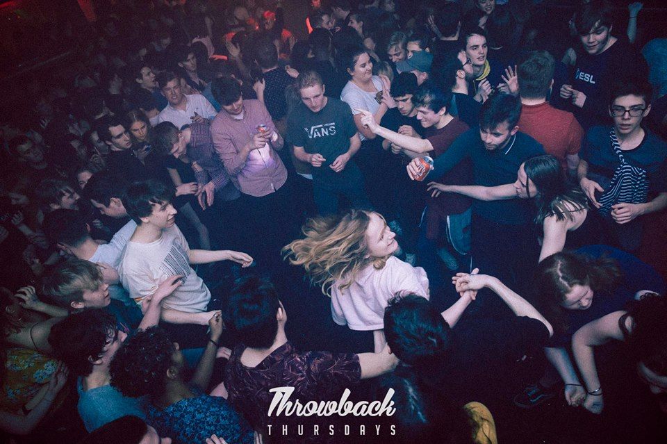 Image may contain: Night Club, Night Life, Club, Party, Crowd, Audience, Human, Person