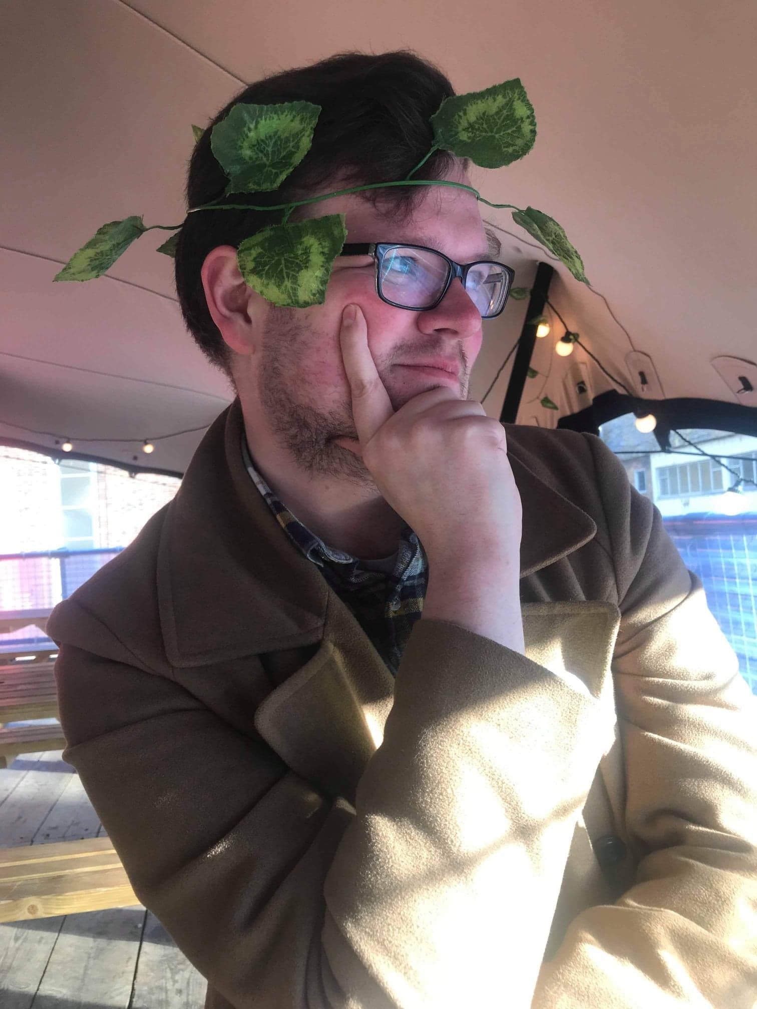 Image may contain: Man, Glasses, Face, Plant, Accessory, Accessories, Sunglasses, Clothing, Apparel, Person, Human