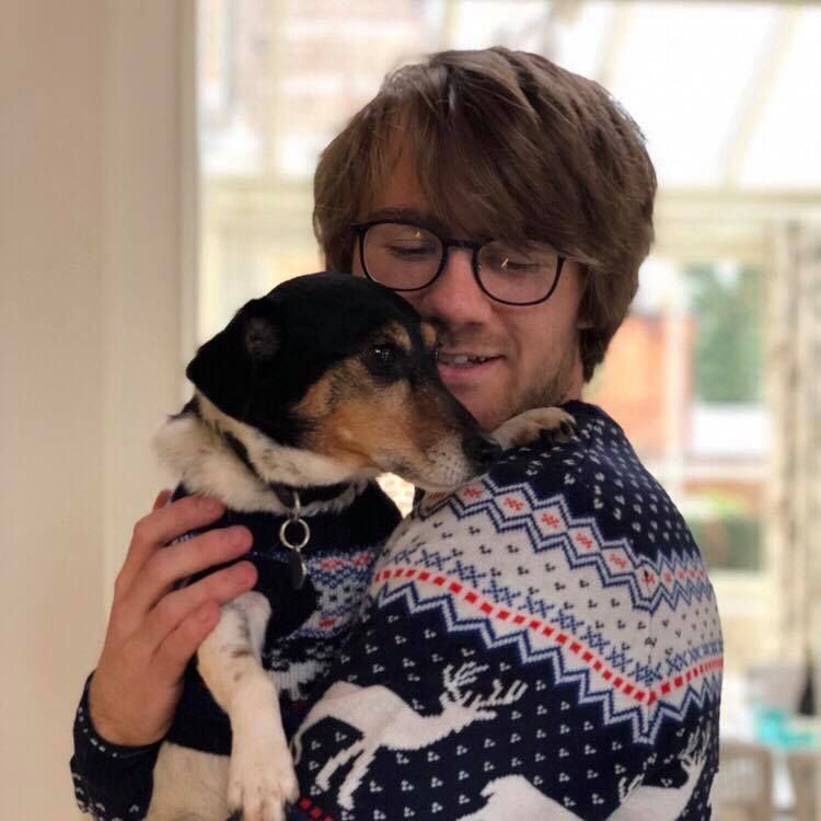 Image may contain: Puppy, Face, Female, Sweater, Dog, Hound, Pet, Mammal, Animal, Canine, Glasses, Accessories, Accessory, Human, Person, Clothing, Apparel