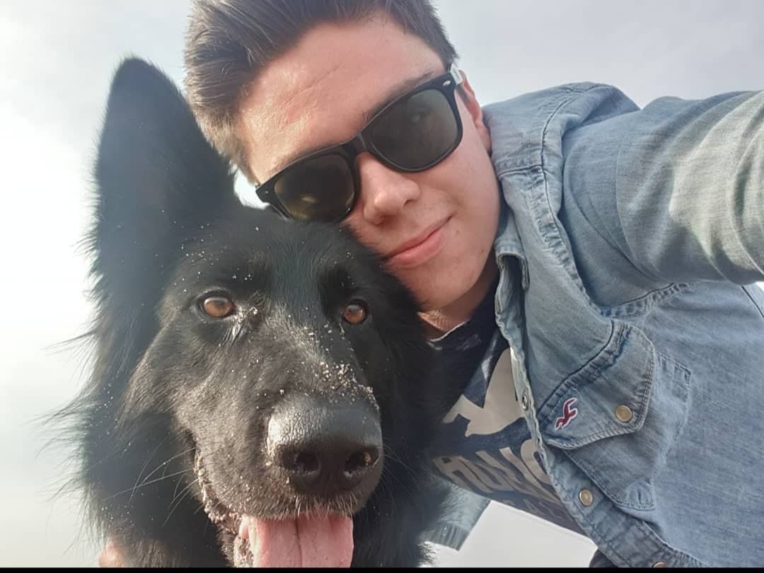 Image may contain: Selfie, Man, Coat, Female, Nature, Photography, Photo, Portrait, Outdoors, Dog, Puppy, Pet, Animal, Canine, Mammal, Glasses, Clothing, Apparel, Face, Person, Human, Accessories, Accessory, Sunglasses
