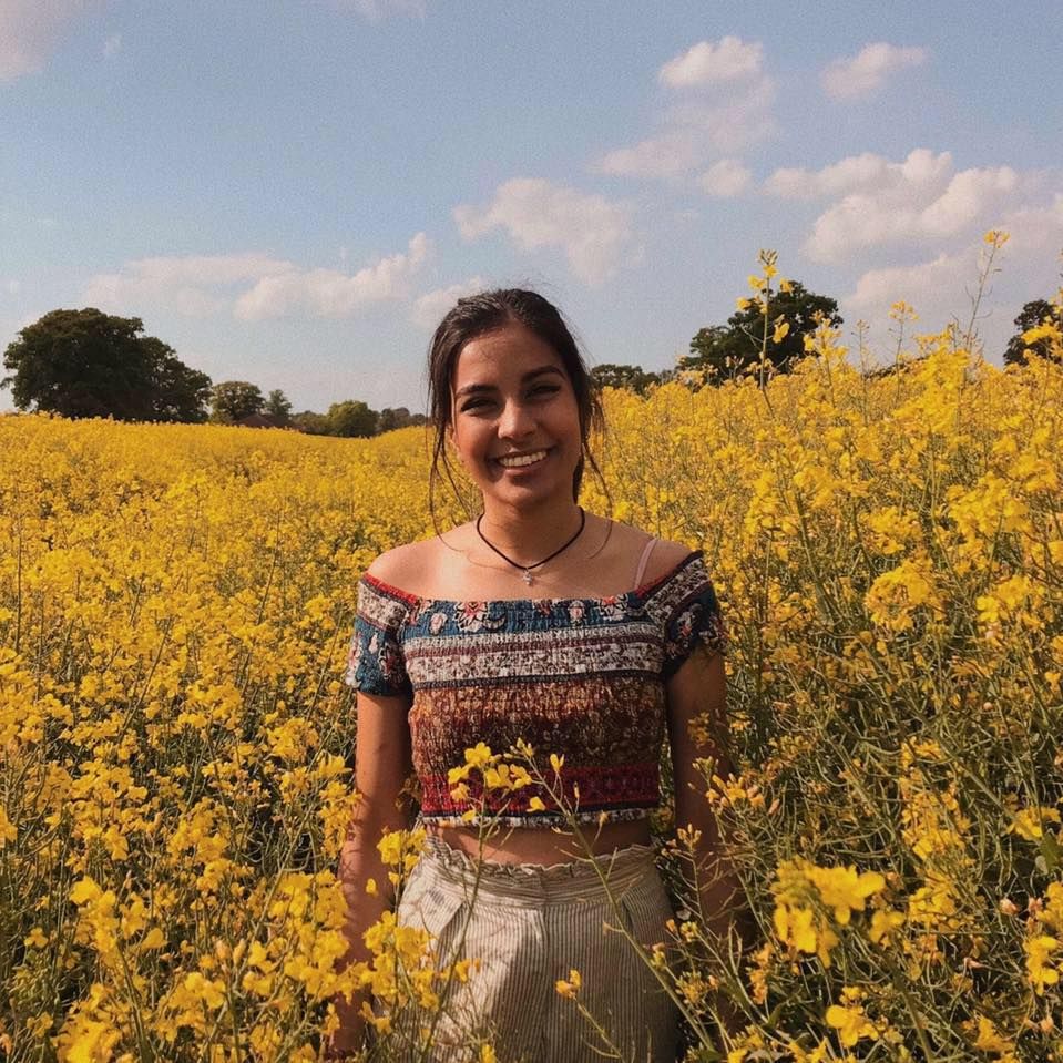 Image may contain: Meadow, Rural, Farm, Countryside, Smile, Dress, Flower, Blossom, Nature, Plant, Face, Clothing, Apparel, Outdoors, Grassland, Teen, Kid, Girl, Woman, Child, Blonde, Field, Person, Human, Female