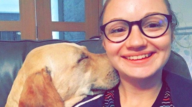 Image may contain: Female, Portrait, Photography, Photo, Dog, Hound, Pet, Canine, Mammal, Animal, Smile, Human, Person, Face, Accessory, Accessories, Glasses