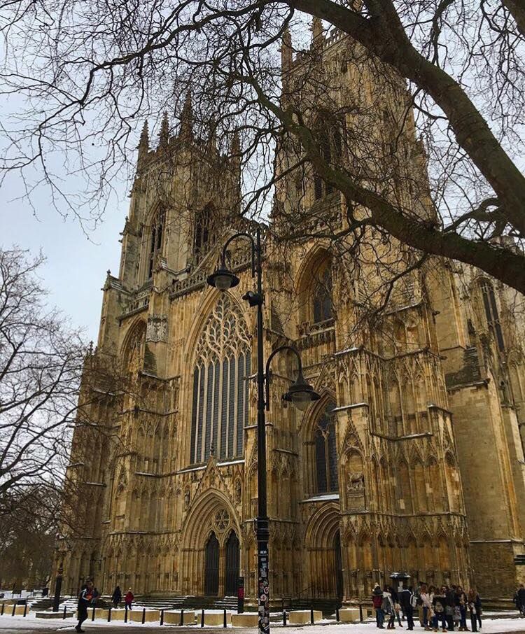 Image may contain: Human, Person, Church, Cathedral, Architecture, Tower, Steeple, Building, Spire
