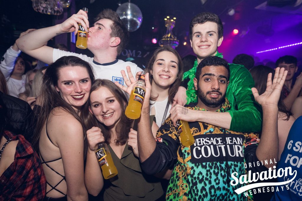 Image may contain: Bottle, Beer, Night Club, Alcohol, Club, Beverage, Drink, Party, Person, Human