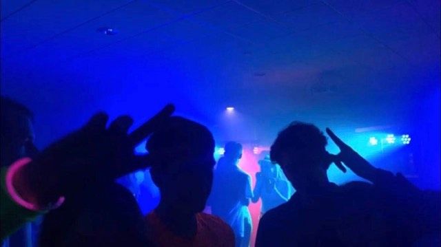 Image may contain: Disco, Night Club, Club, Human, Person