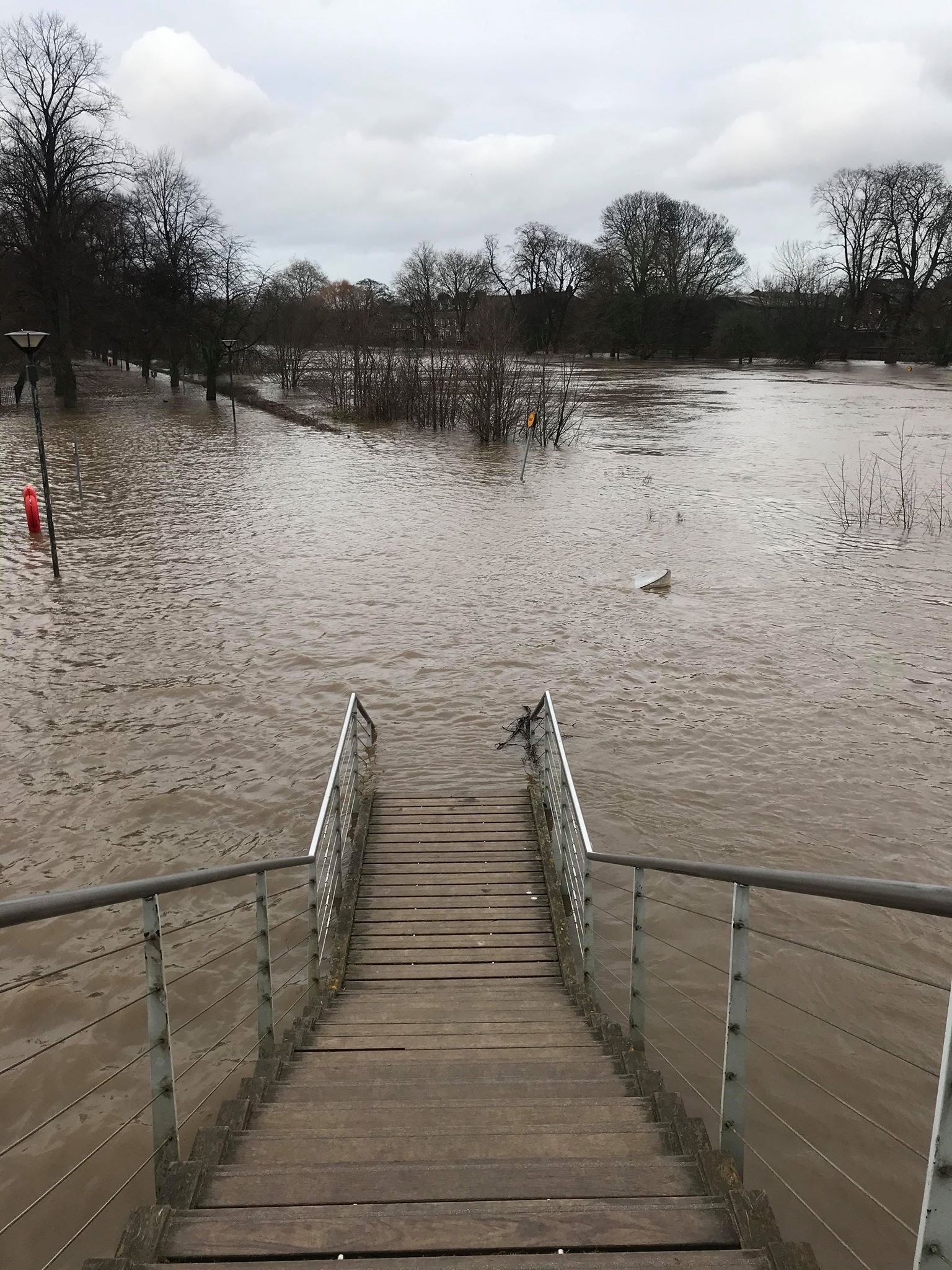 Image may contain: Flood, Nature, Banister, Handrail, Boardwalk, Building, Bridge, Railing, Pier, Dock, Port, Waterfront, Water