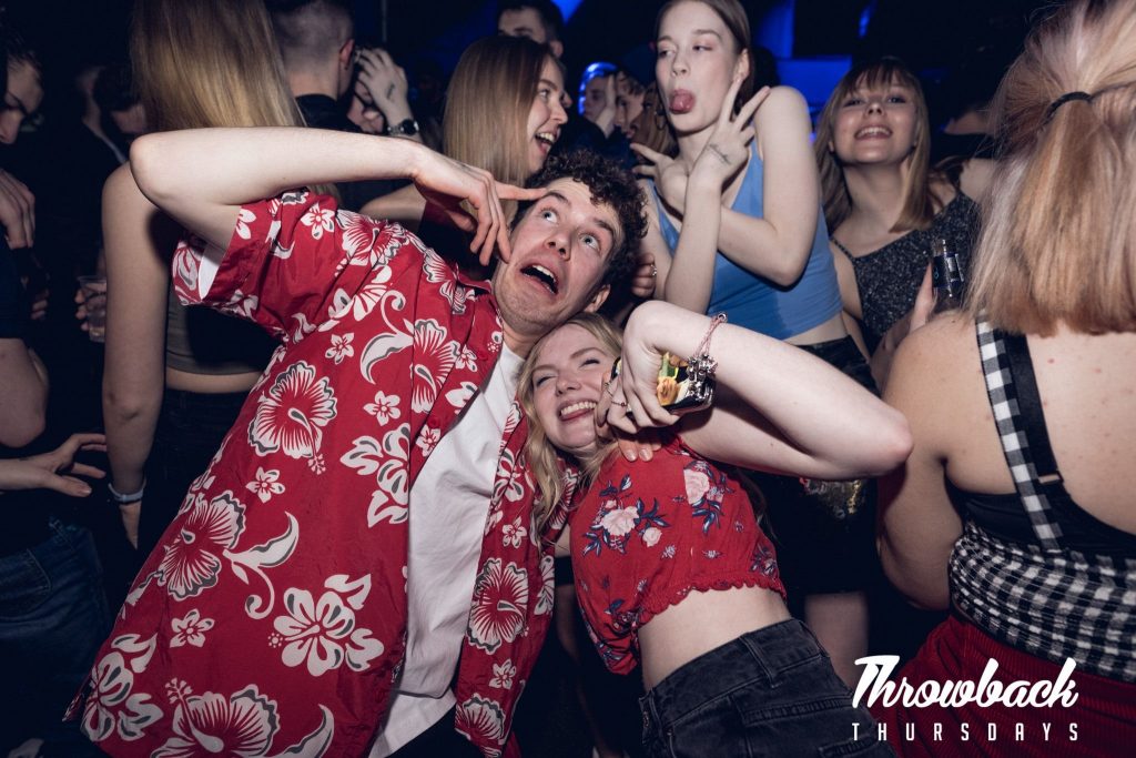 Image may contain: Leisure Activities, Night Life, Night Club, Club, Party, Person, Human