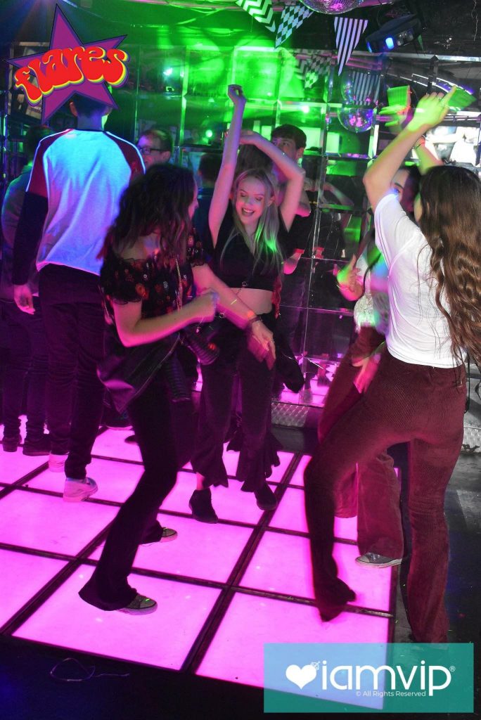 Image may contain: Party, Disco, Night Life, Night Club, Club, Person, Human