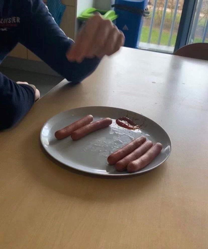 a plate of hotdogs