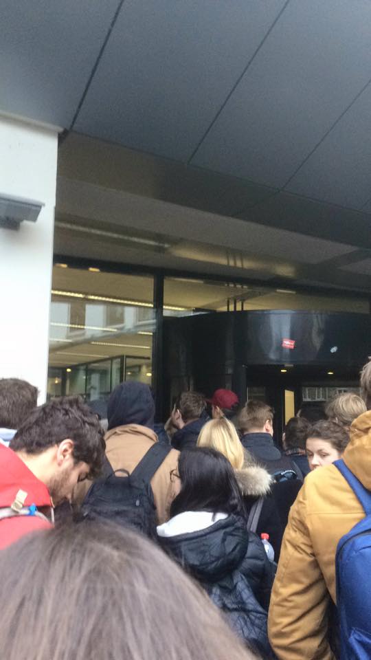 Students lining up to get into the Maastrict Universty library in the morning.