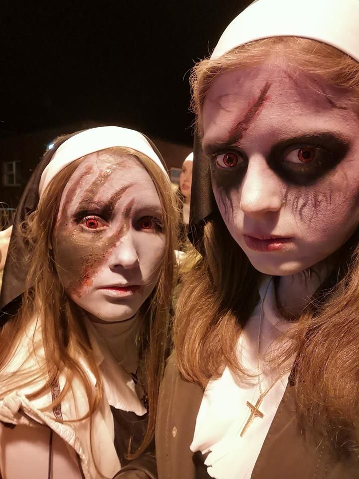 Image may contain: Crowd, Clothing, Apparel, Costume, Head, Face, Human, Person