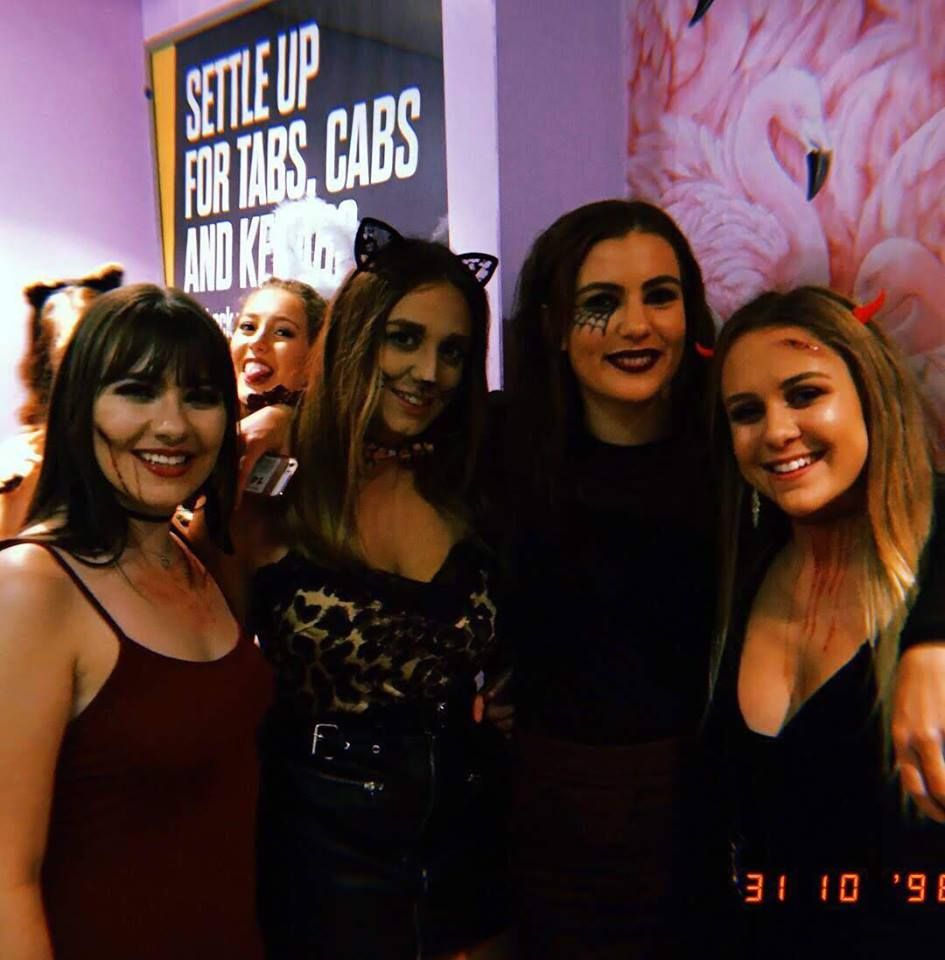 Image may contain: Bar Counter, Clothing, Apparel, Pub, Party, Indoors, Interior Design, Night Club, Club, Night Life, Human, Person