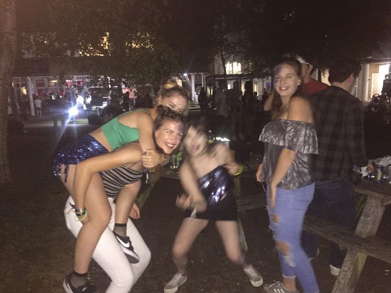 Image may contain: Girl, Club, Nature, Female, Outdoors, Face, Shorts, Lighting, Clothing, Apparel, Footwear, Shoe, Night Life, Person, Human