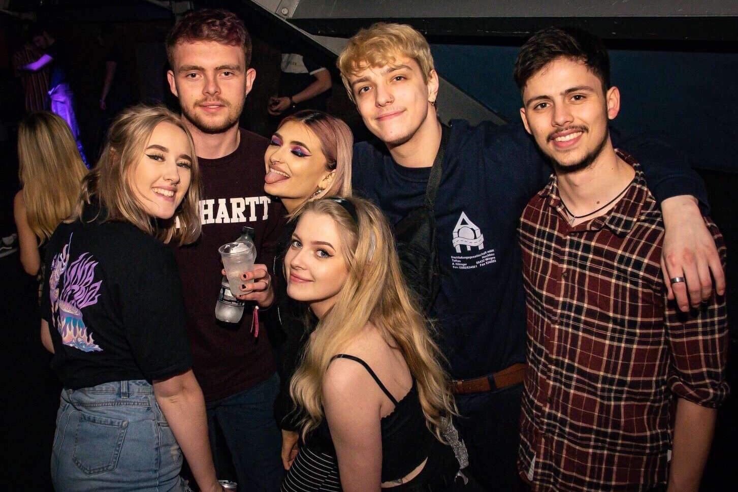 Image may contain: Face, Bar Counter, Pub, Night Life, Night Club, Party, Club, Human, Person